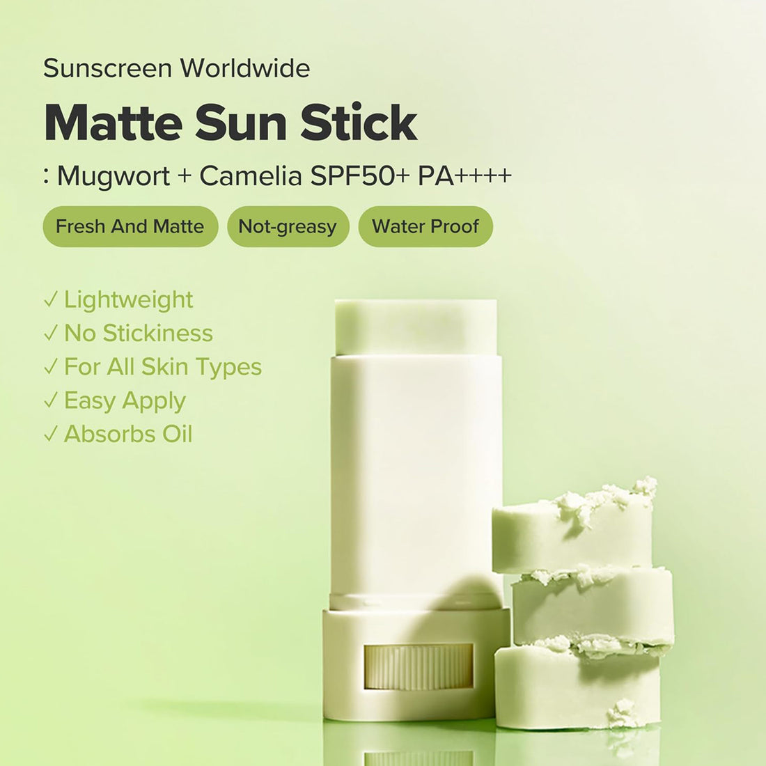 Sunscreen stick with packaging on a light green background