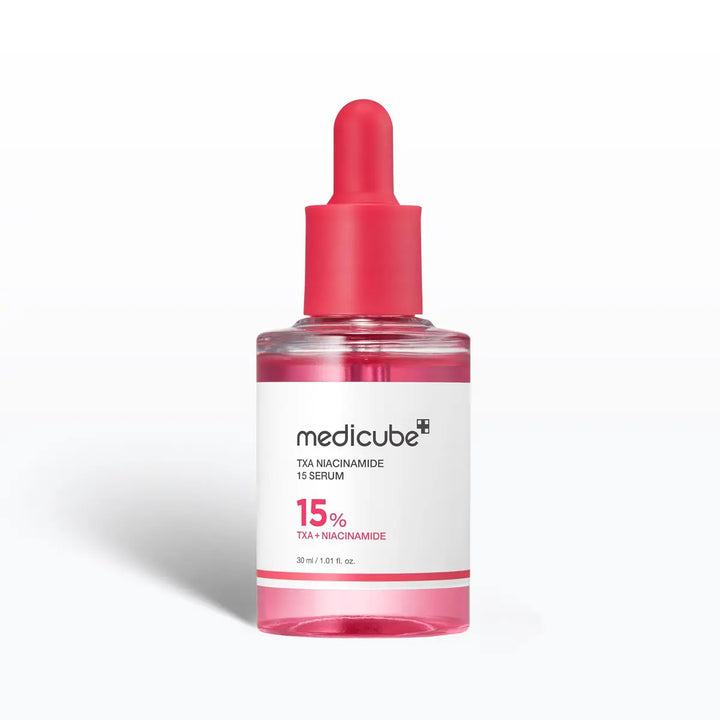 Medicube TXA+Niacinamide 15 Glow Facial Serum 30mL in a clear bottle with a dropper and pink cap.