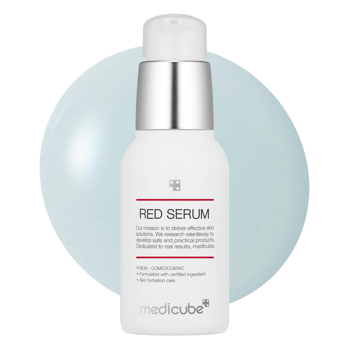 Medicube Red Serum bottle on a light blue background