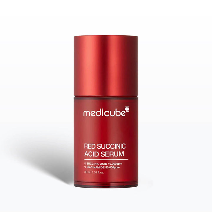 Red succinic acid serum bottle with Medicube branding on a white background