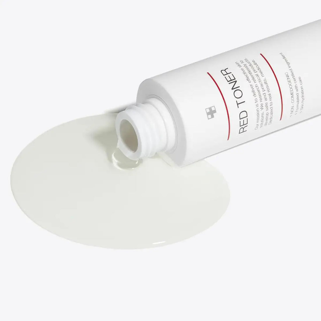 Tube of Red Toner on a white background