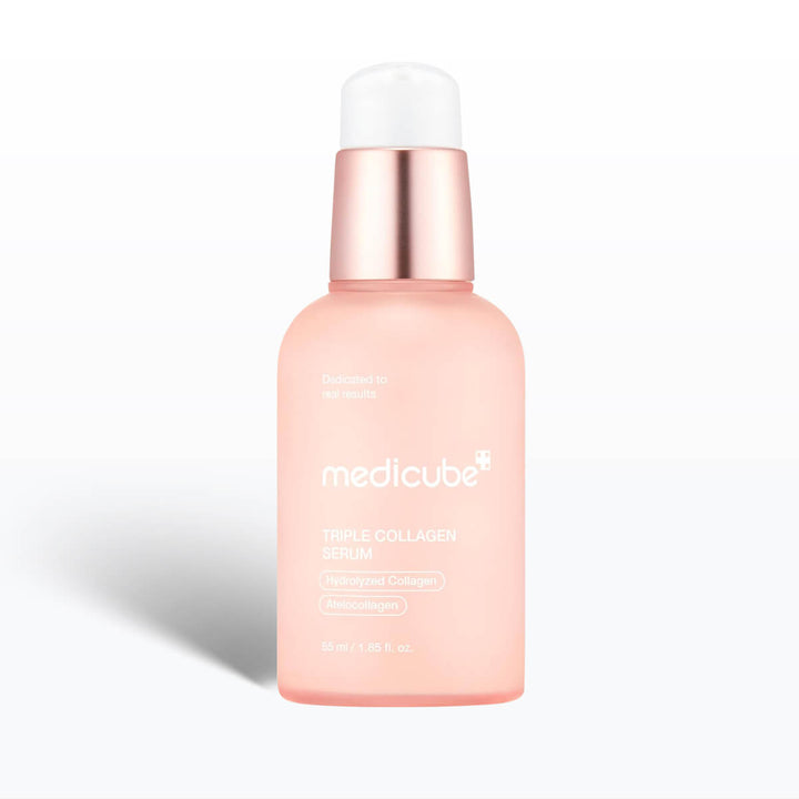 Medicube Pink skincare serum bottle with white cap on a light gray background