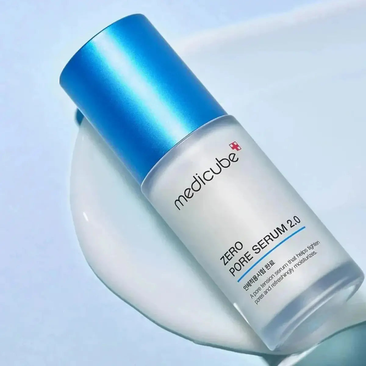 Medicube Zero Pore Serum 2.0 bottle on a light blue background