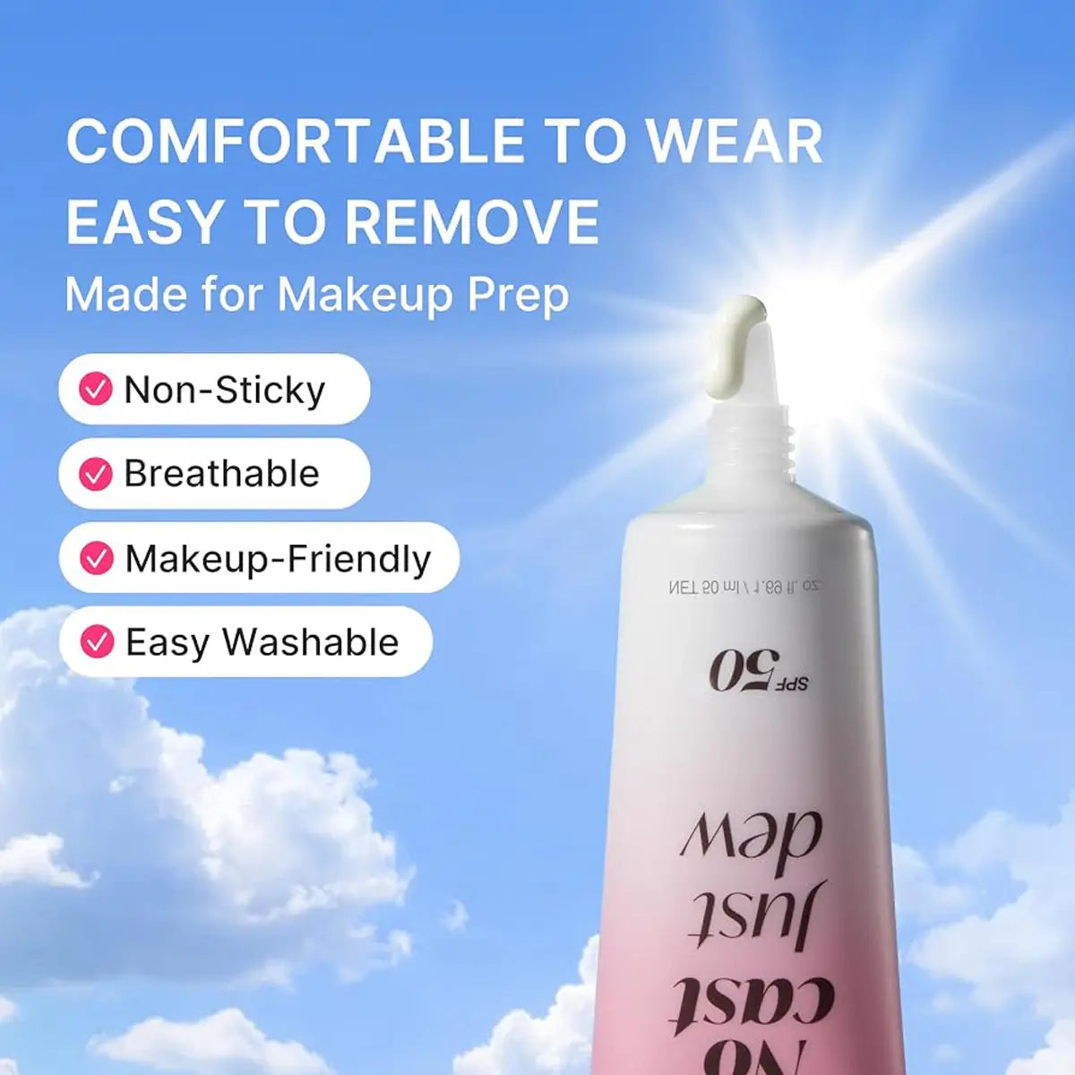 A cosmetic tube labeled 'just dew no cast' shown against a bright blue sky background with clouds and sun rays. Text on the image highlights comfort, removability, and makeup-friendly properties, with checkmarks for non-sticky, breathable, makeup-friendly, and easy washable qualities.