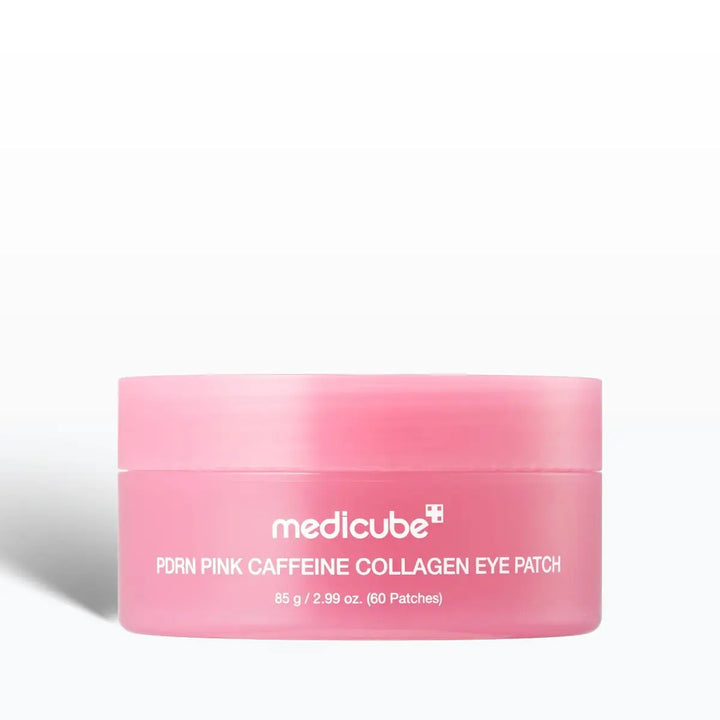 A pink cosmetic jar labeled 'medicube PORN PINK CAFFEINE COLLAGEN EYE PATCH' on a clean white background.