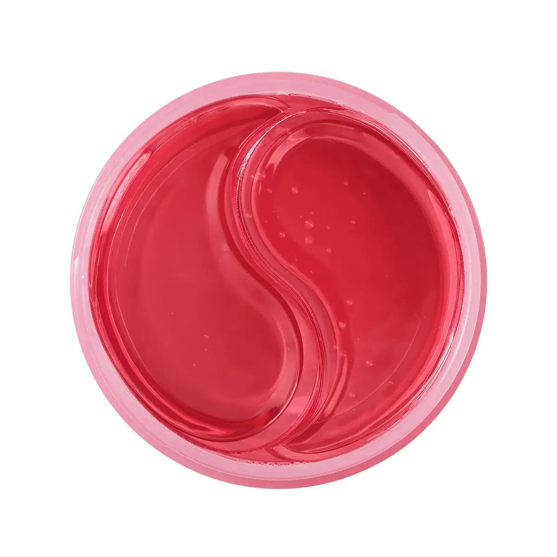 A round pink cosmetic container filled with a translucent red gel or patch, photographed from above on a plain white background.