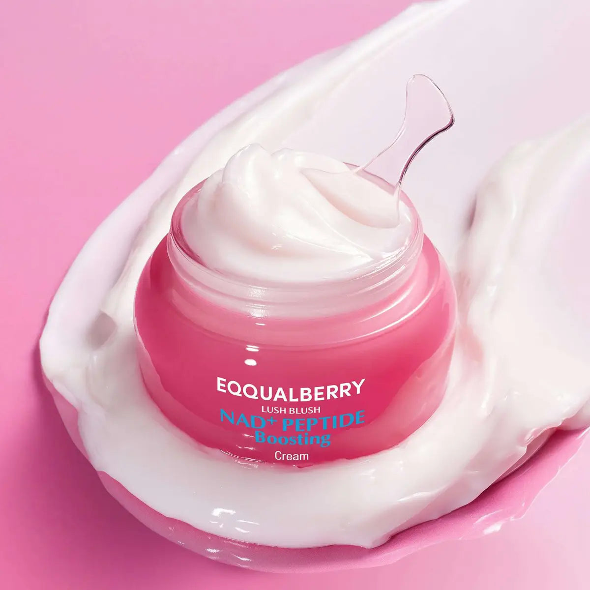 Eqqualberry NAD+ Peptide Boosting Cream with visible brand name on a pink background