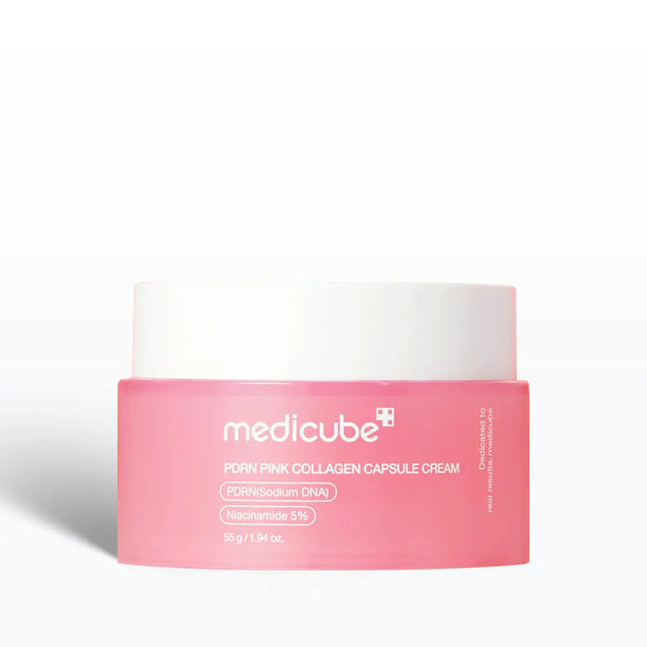Pink and white cosmetic cream container with 'medicube' branding on a white background