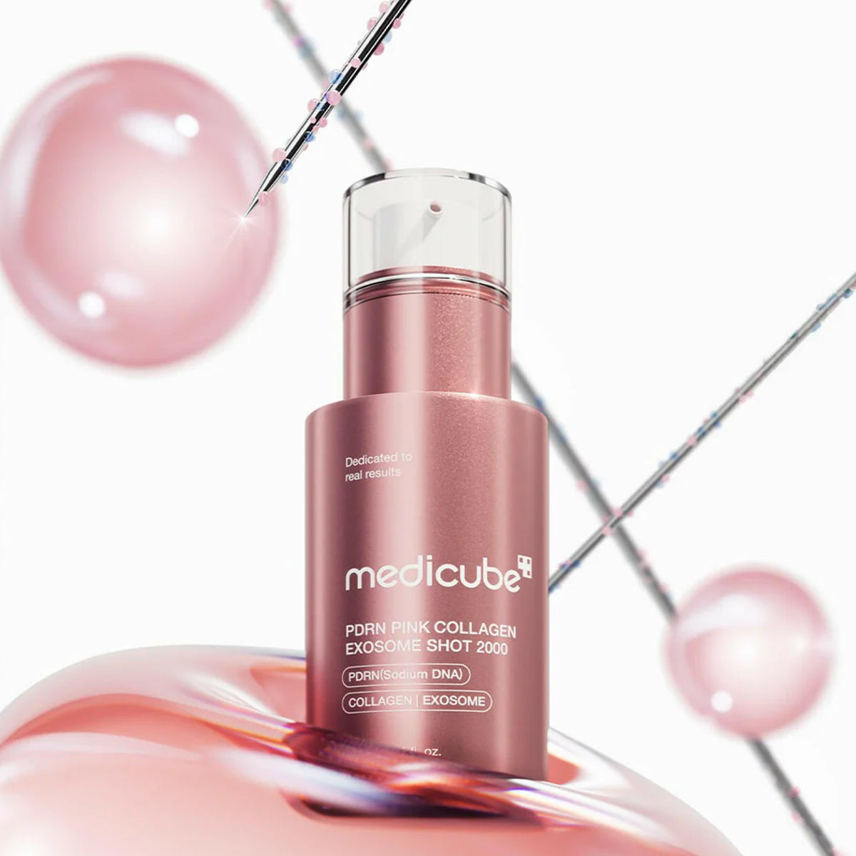Pink skincare product with 'medicube' branding on a white background