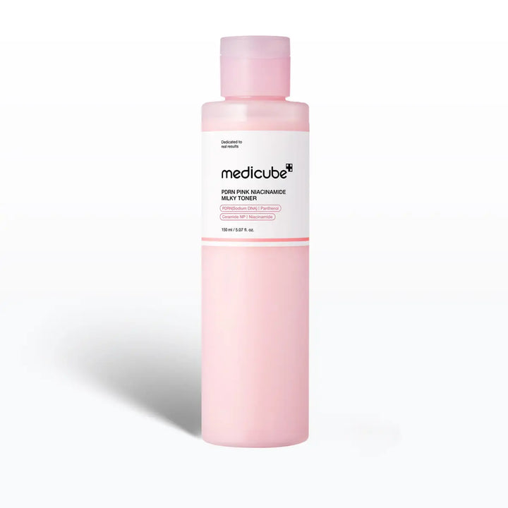 Pink bottle of Medicube toner on a white background