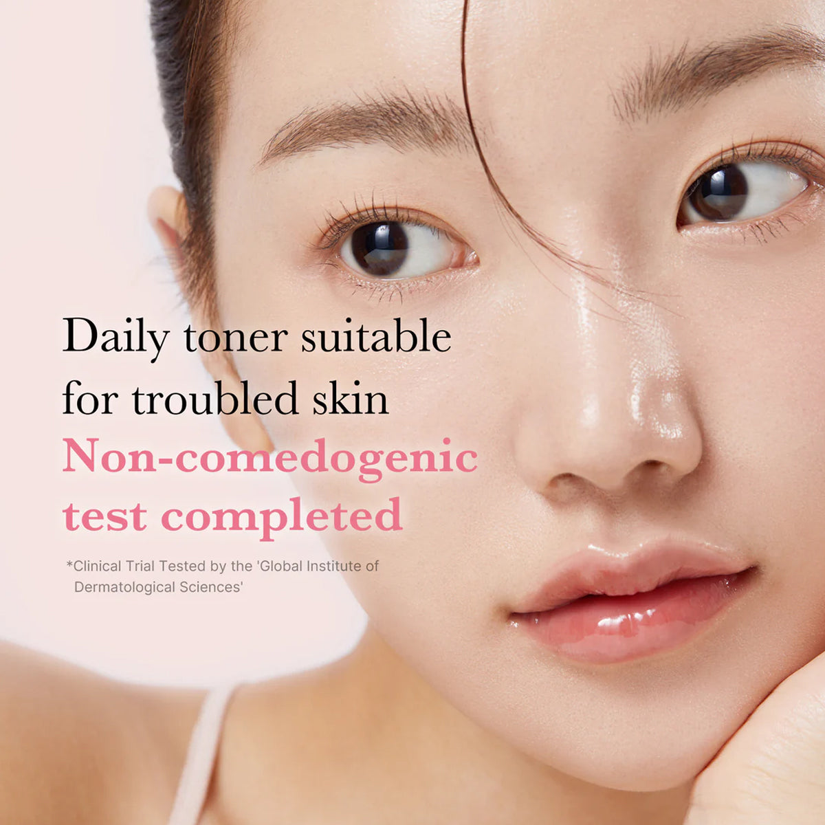 Advertisement for a daily toner suitable for troubled skin with a close-up of a person's face.