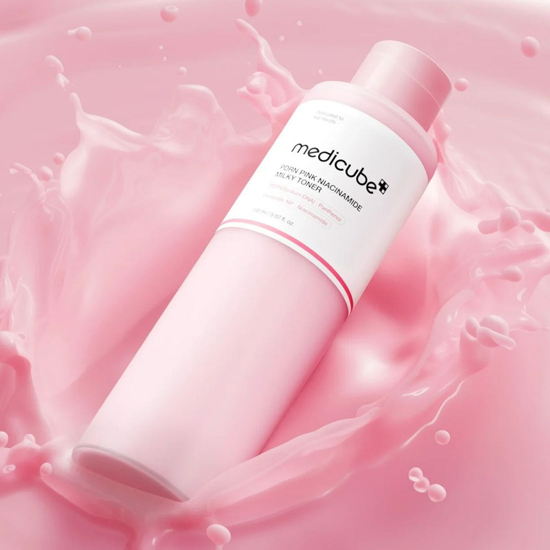 Medicube skincare product on a pink background