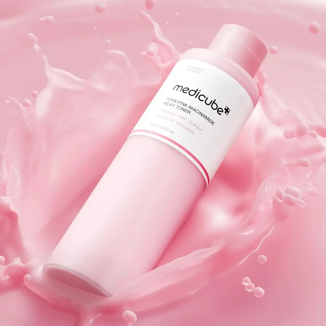 Medicube skincare product on a pink background