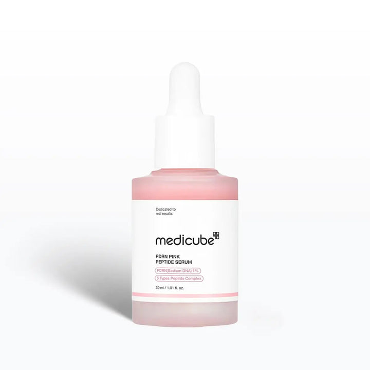 Medicube pink peptide serum bottle on a white background