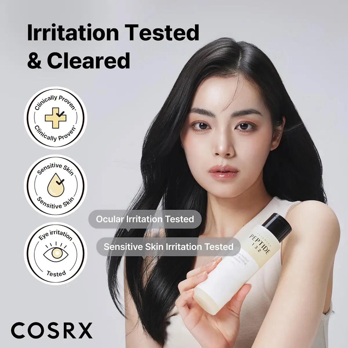 Woman holding a COSRX hair care product with irritation testing icons and text on a light gray background.