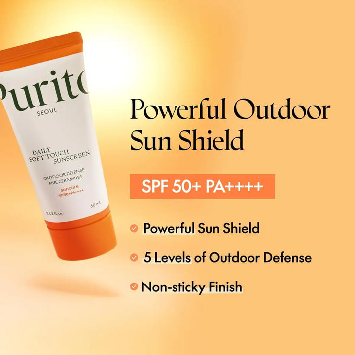 Purito sunscreen tube with product details on an orange background