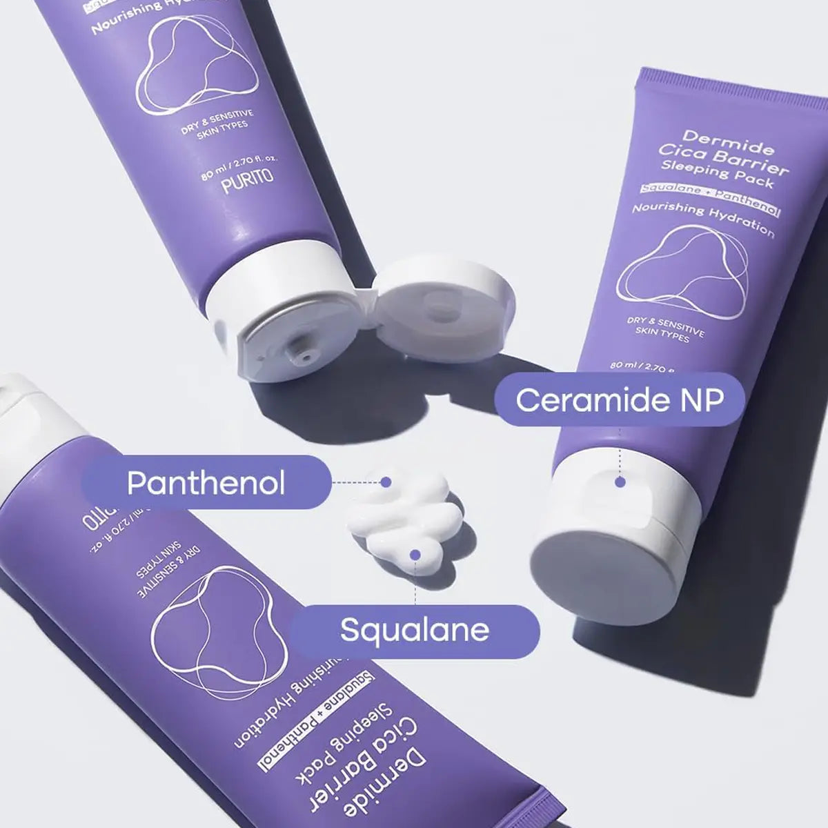 Three purple skincare products with white caps on a light gray background