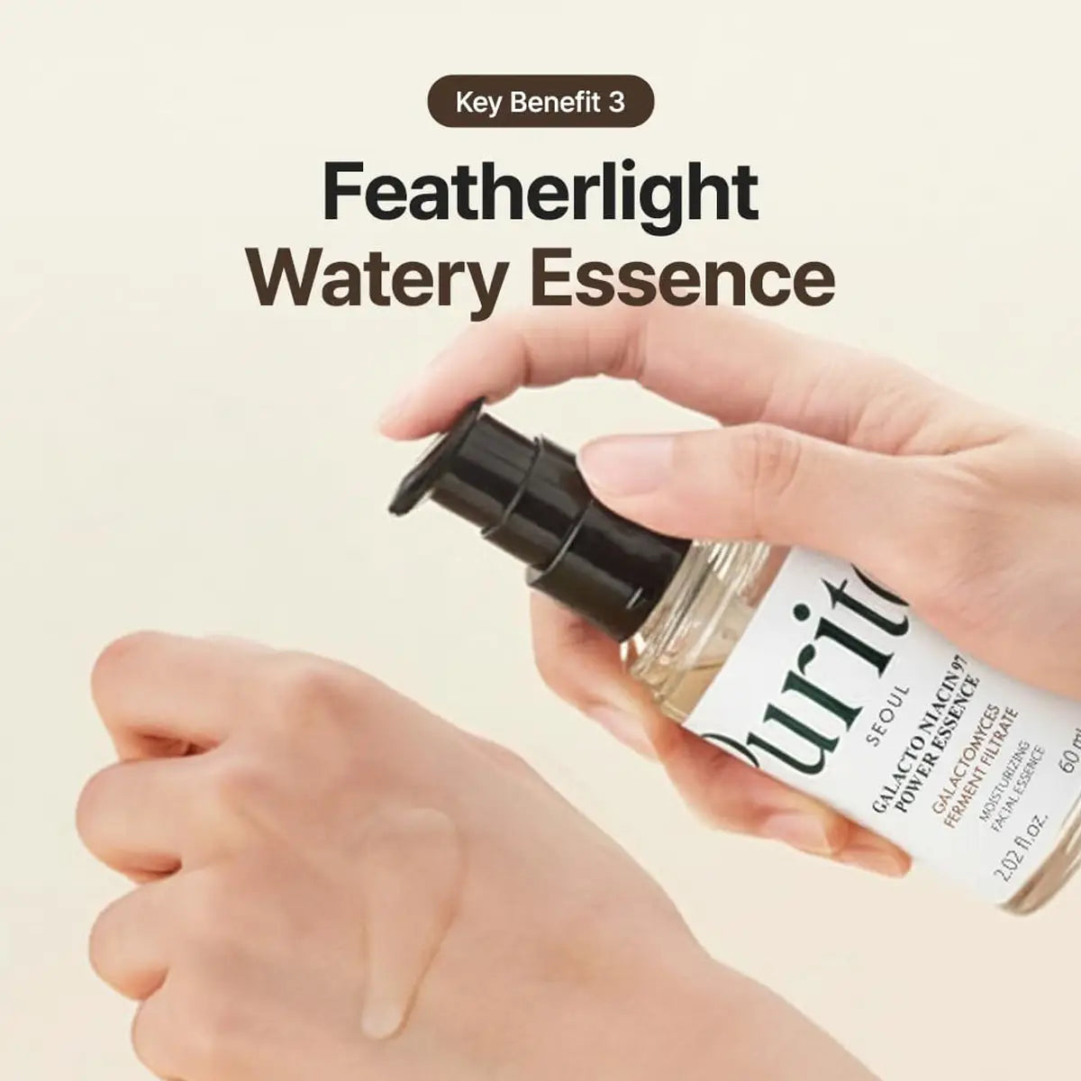 Purito Galacto Niacin 97 Power Essence 60mL being applied for a lightweight, watery texture.