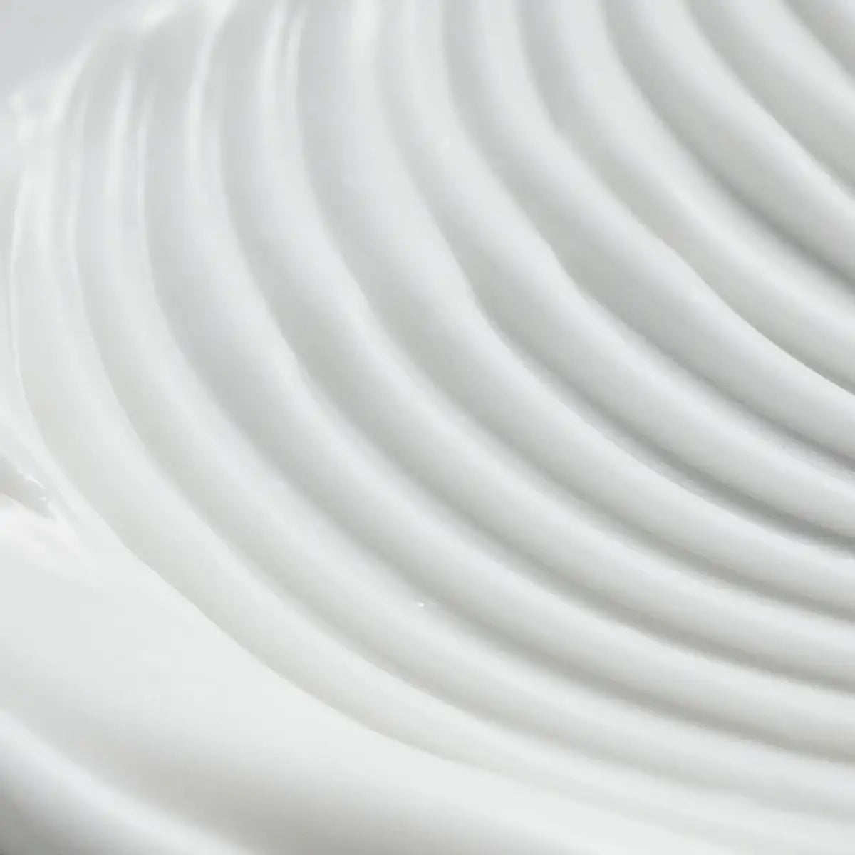 Close-up of white fabric with wavy texture