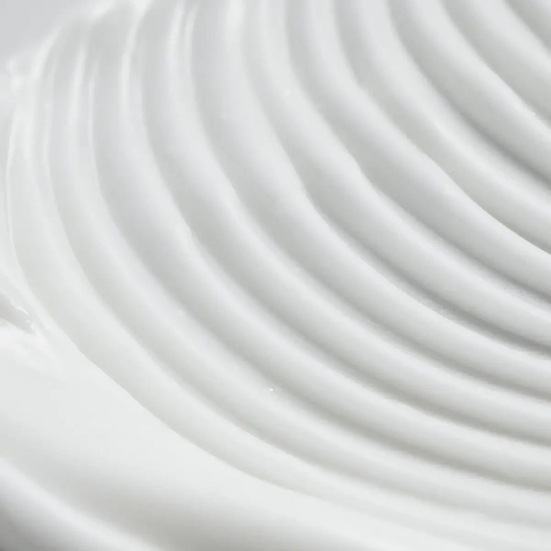 Close-up of white fabric with wavy texture