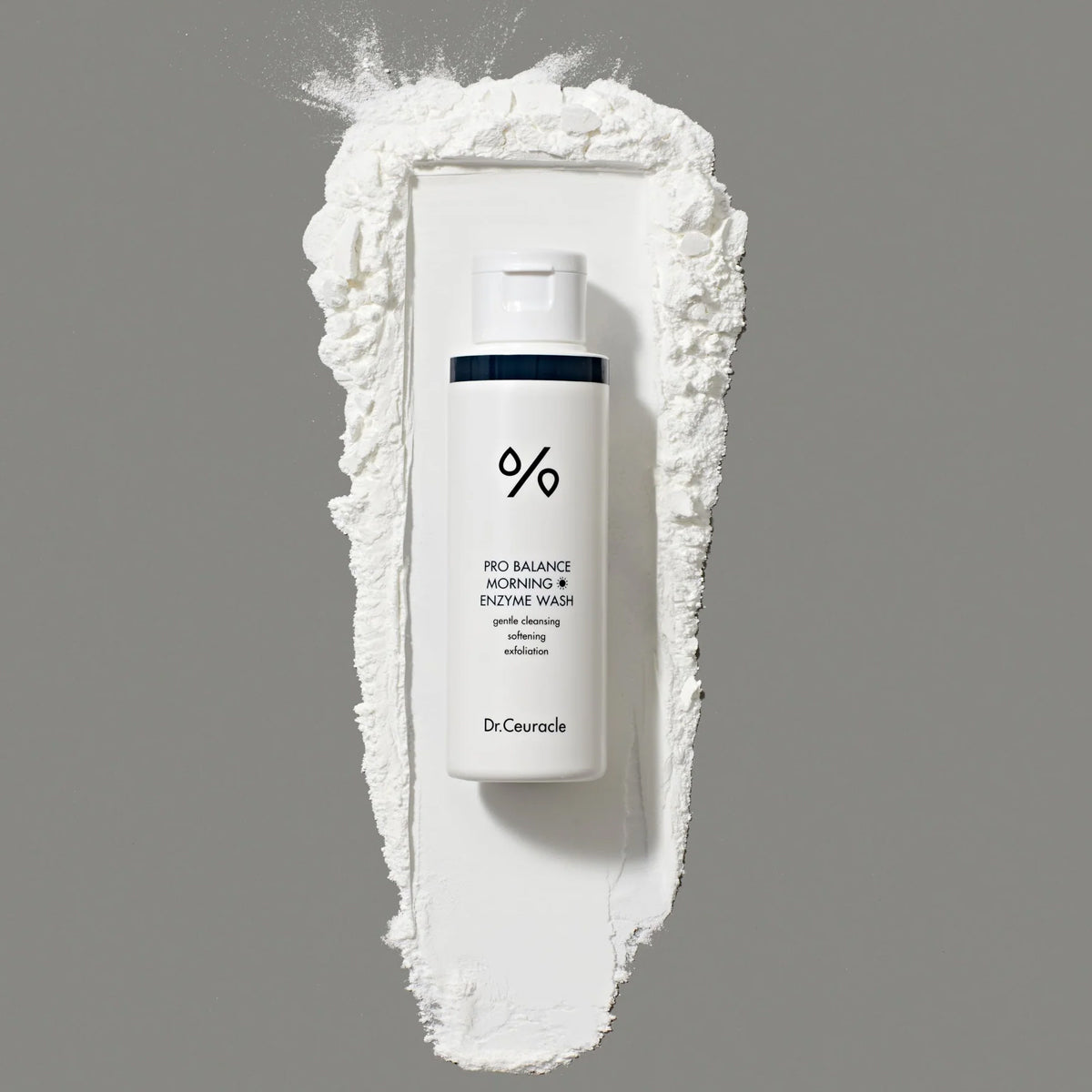 Dr. Ceuracle skincare product with white powder on a gray background