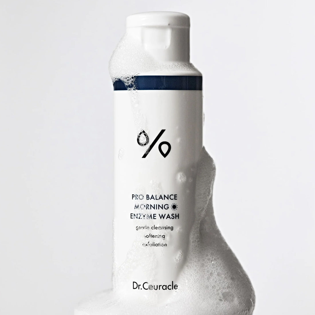 Dr. Ceuracle Pro Balance Morning Enzyme Wash bottle with foam on a light gray background