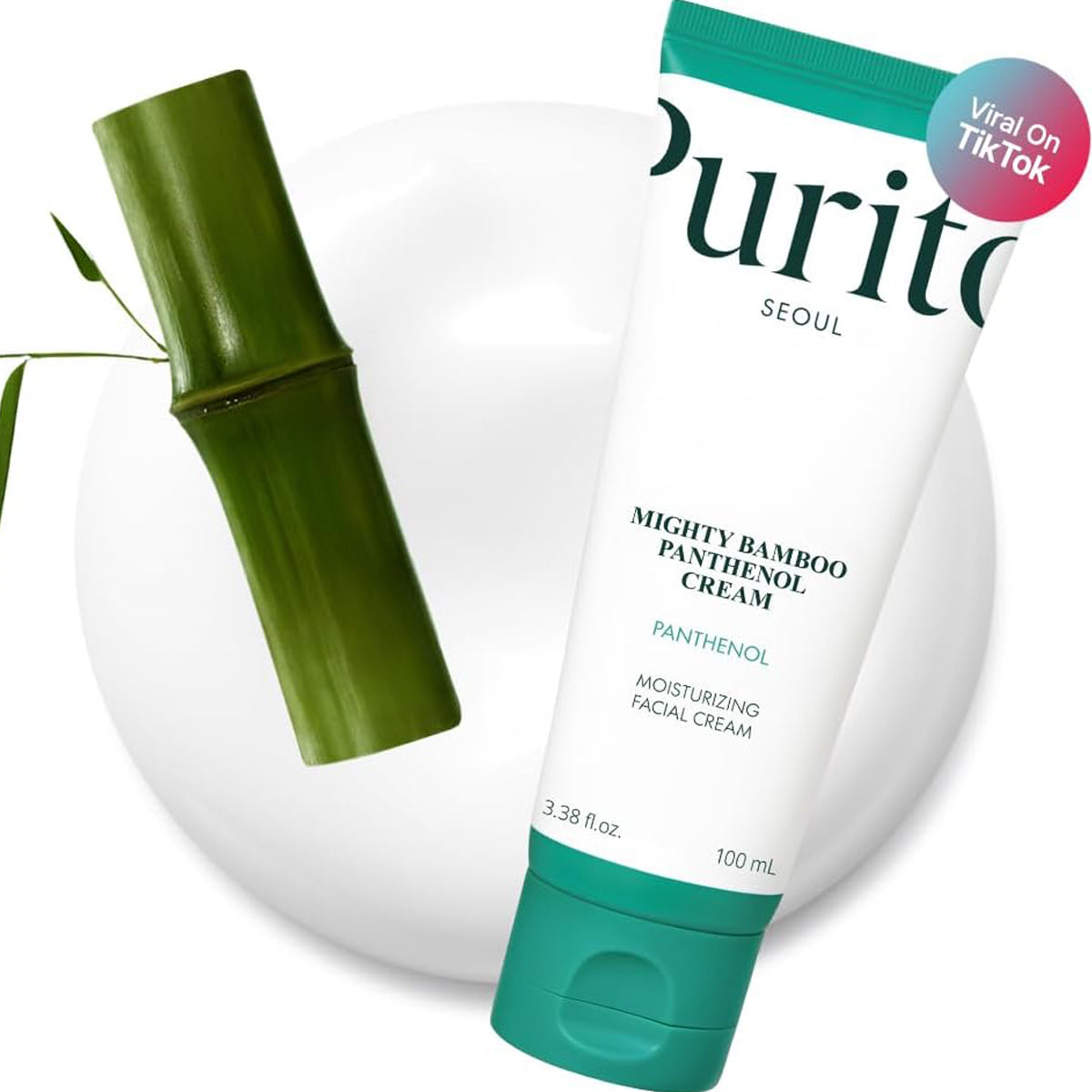 Purito Mighty Bamboo Panthenol Cream with green bamboo shoot on a white background