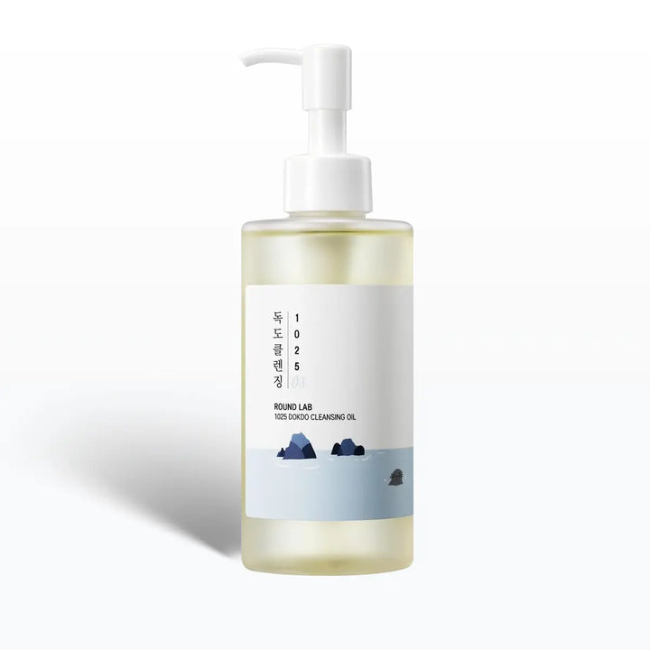 Bottle of ROUND LAB cleansing oil with a pump on a white background