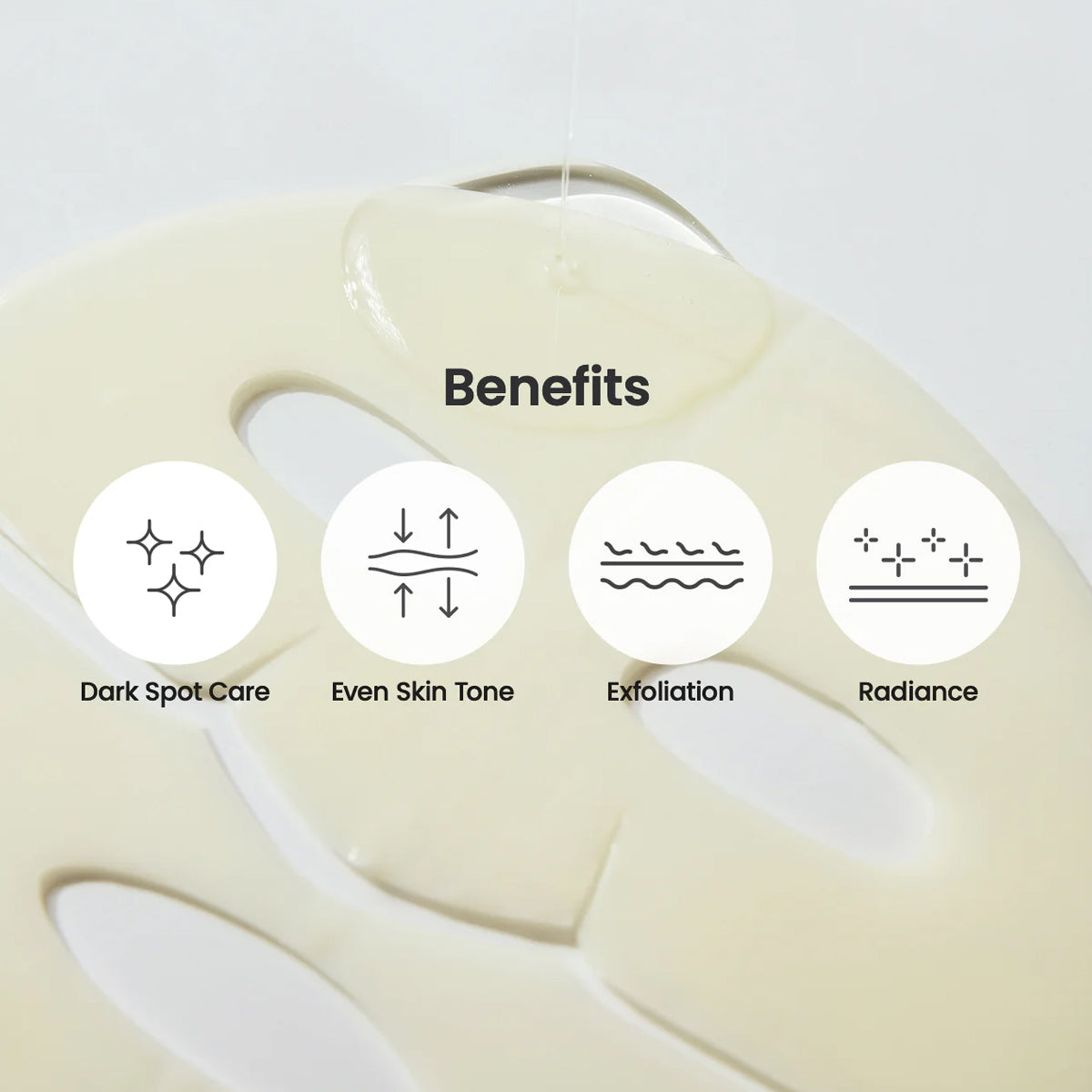 Skincare device with labeled benefits on a white background