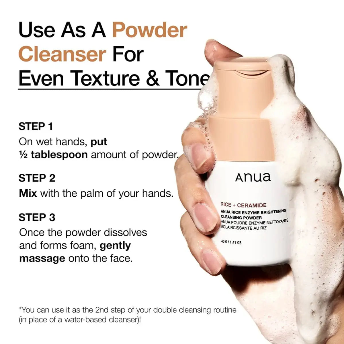 Hand holding a bottle of 'anua' powder cleanser with usage instructions on a white background.