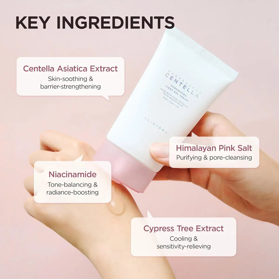 Skincare product with labeled key ingredients on a pink background