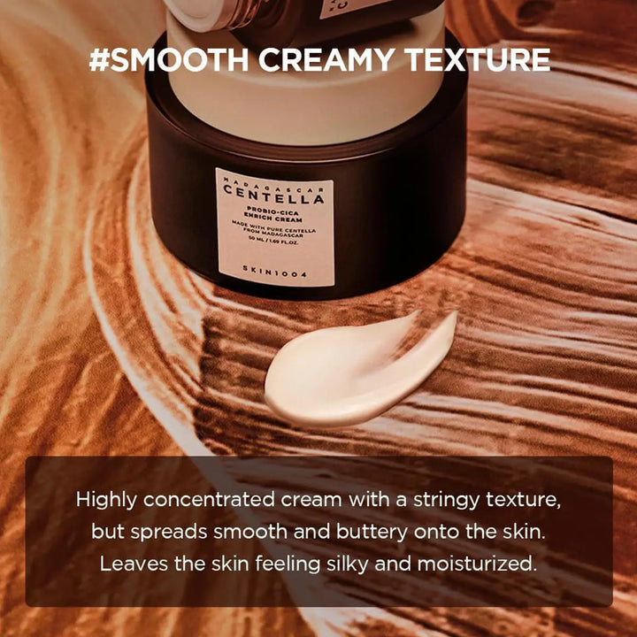 Skincare cream jar with a smear on a wooden surface, labeled 'Smooth Creamy Texture'.