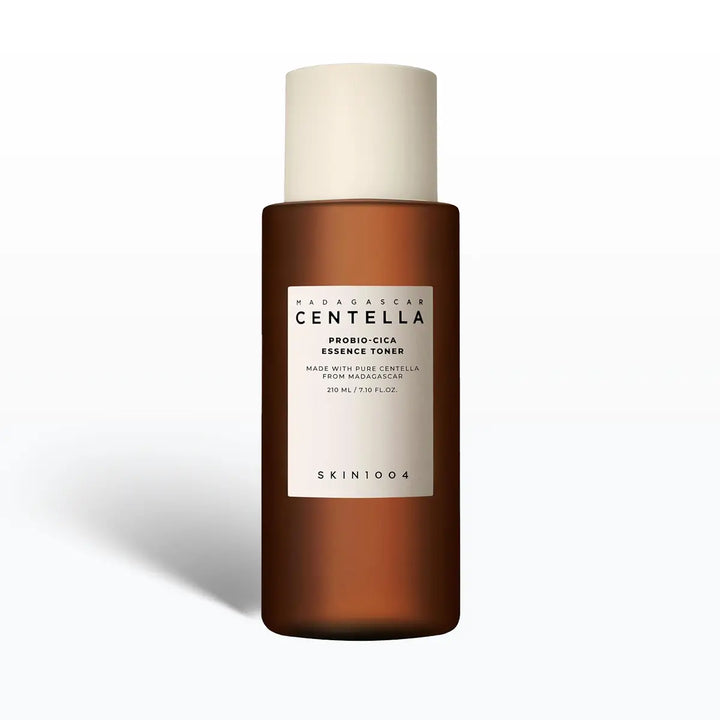 Brown bottle with white cap labeled SKIN1004 Madagascar Centella Probio-Cica Essense Toner on a white background