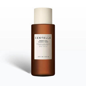 Brown bottle with white cap labeled SKIN1004 Madagascar Centella Probio-Cica Essense Toner on a white background