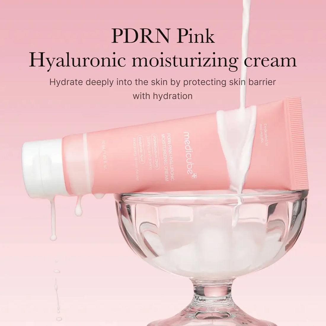 Pink hyaluronic moisturizing cream being poured into a glass bowl with a pink background and text.