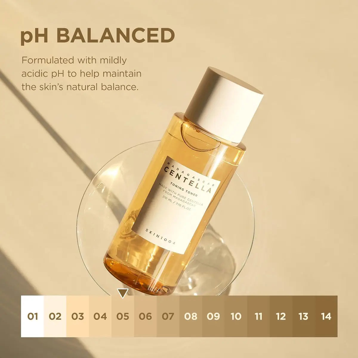 Skin1004 Madagascar Centella Toning Toner bottle on a beige background with pH balanced text.