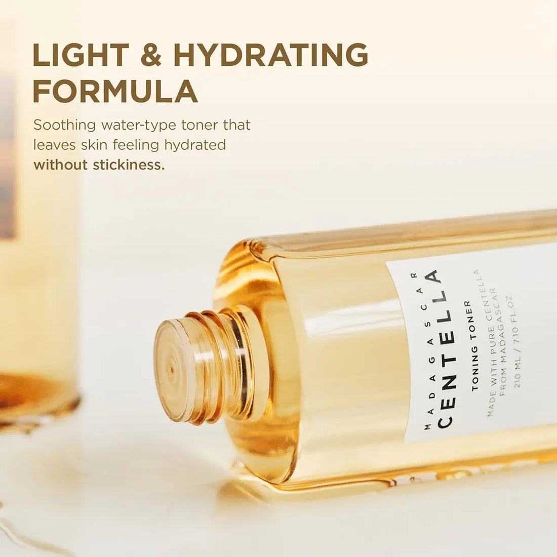 Bottle of Madagascar Centella toner with text about light and hydrating formula on a white background