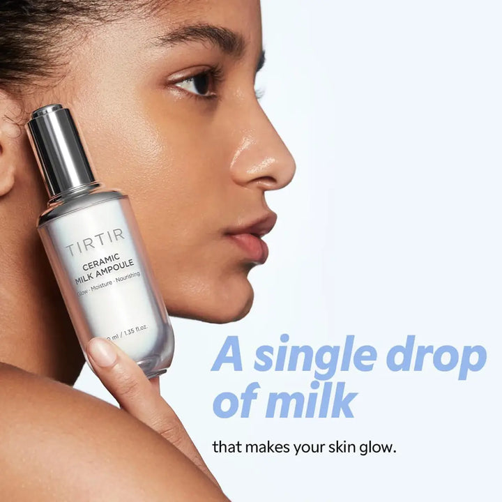 Woman holding a TIRTIR ceramic milk ampoule bottle with text about its benefits.