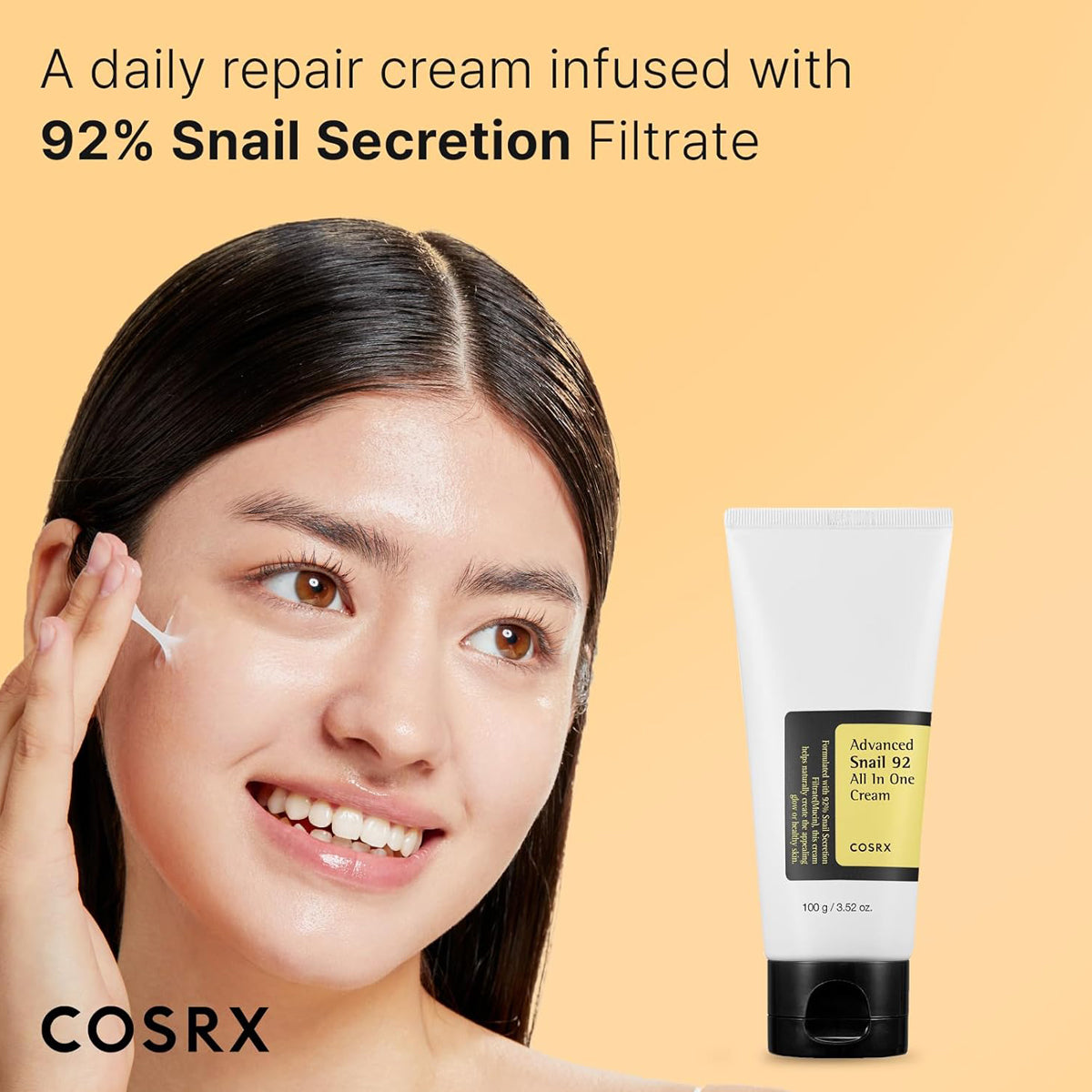 Woman applying cream to her face with a COSRX skincare product on a beige background