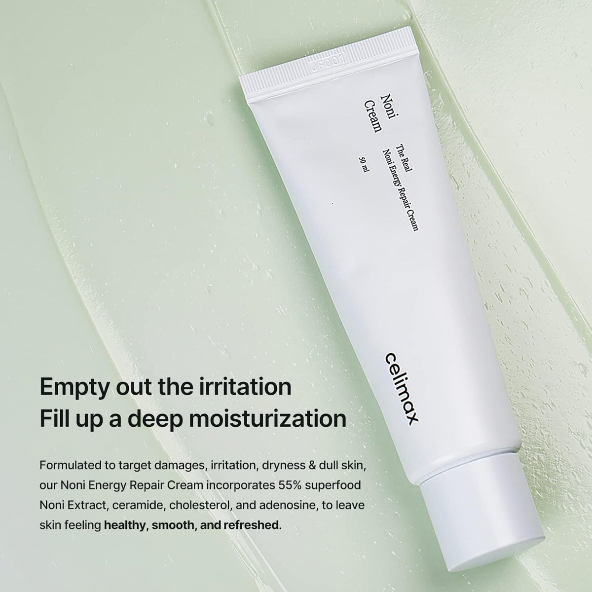 White tube of Celmax Noni Energy Repair Cream on a light green background