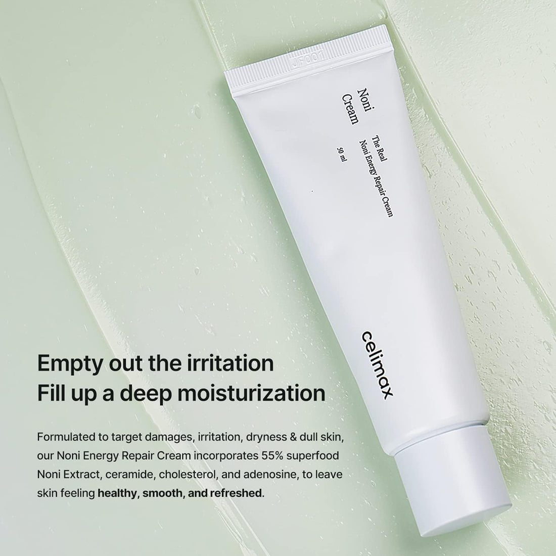 White tube of Celmax Noni Energy Repair Cream on a light green background