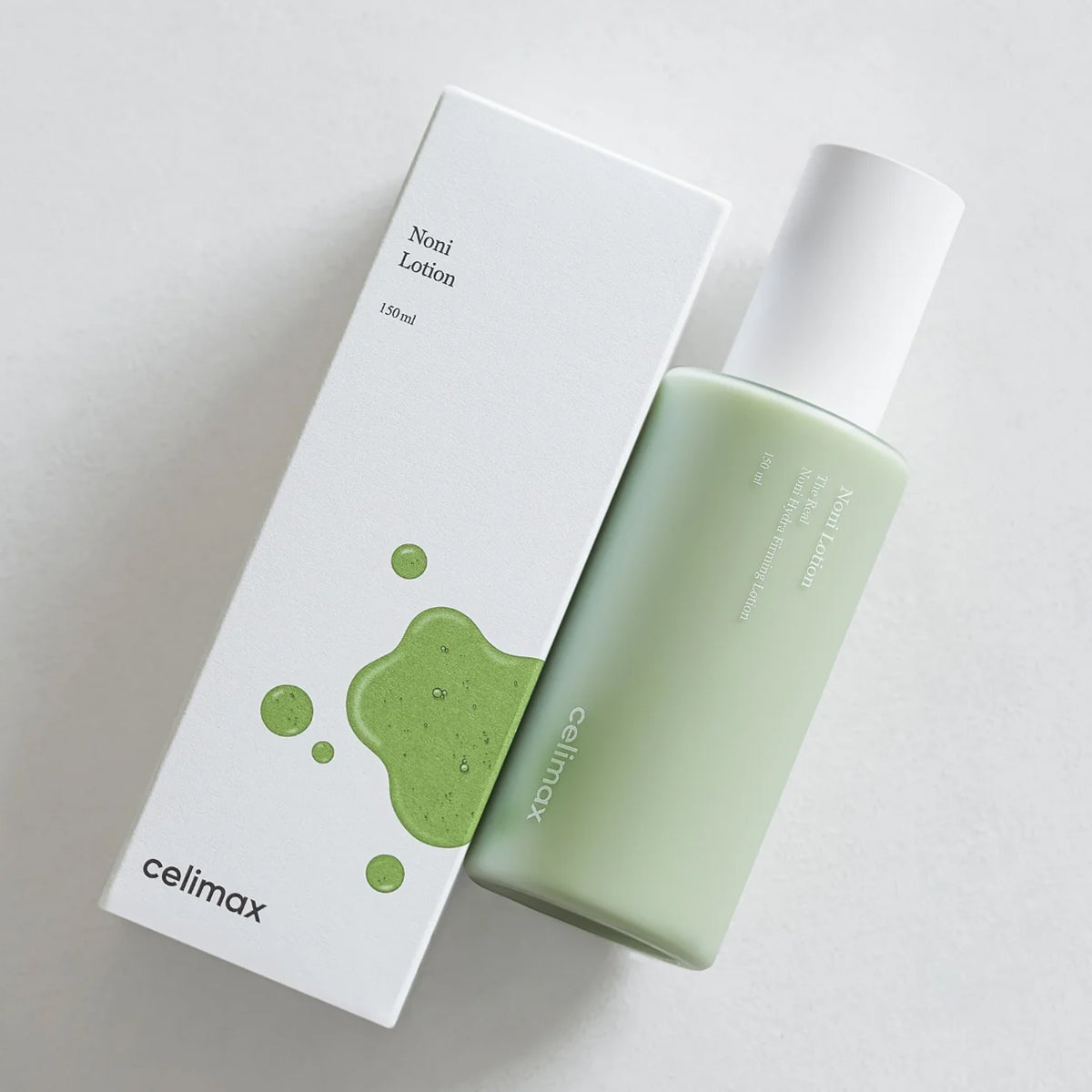 Celimax Nomi Lotion bottle and packaging on a light gray background