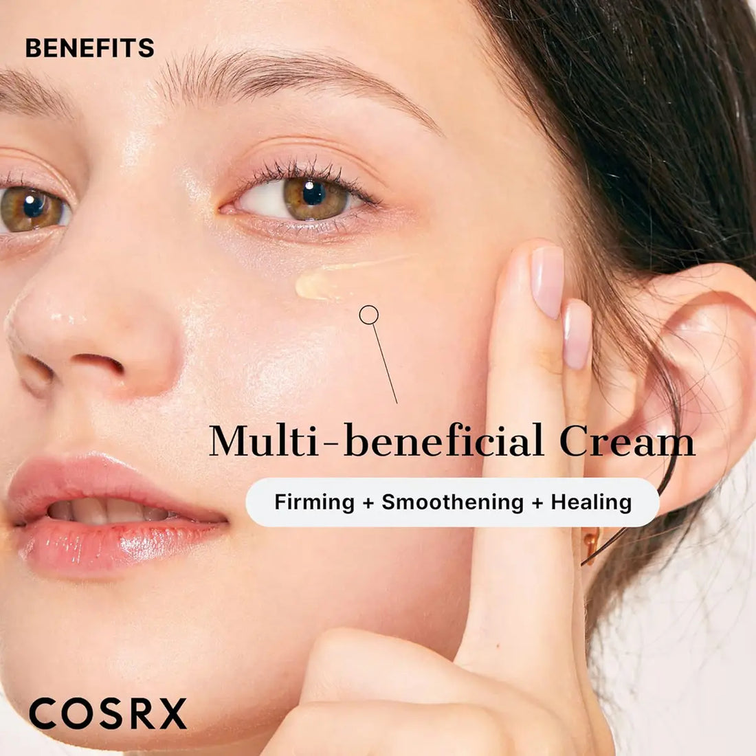 Woman applying multi-beneficial cream to her face with COSRX branding.