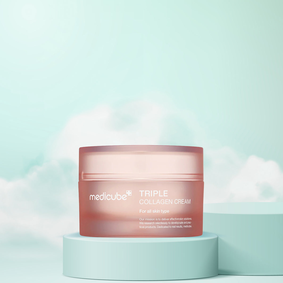 A jar of Medicube Triple Collagen Cream placed on a pedestal against a sky with clouds, indicating a skincare product.