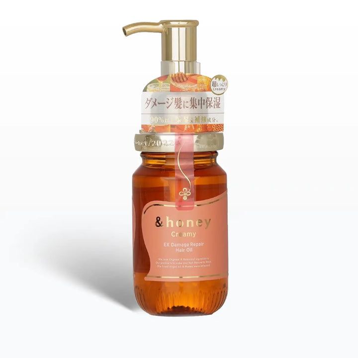 &Honey Creamy EX Damage Repair Hair Oil 100mL bottle with pump, designed for silky, hydrated hair.