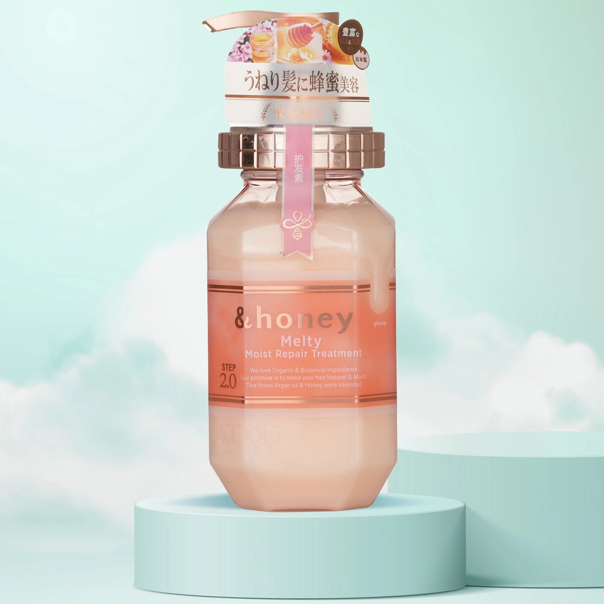 A bottle of &Honey Melty Moist Repair Treatment with a pink label and cap, set against a pastel background.