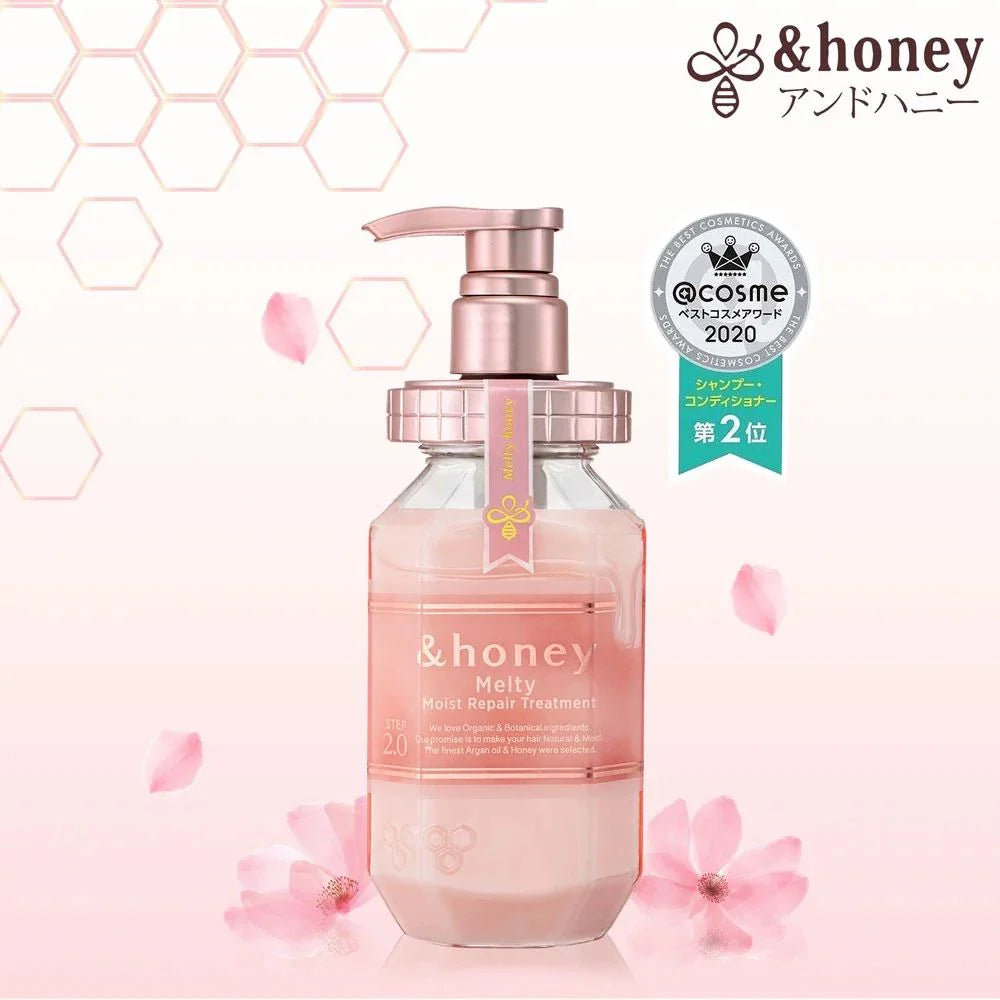 Skincare bottle with pink flowers and awards on a light background