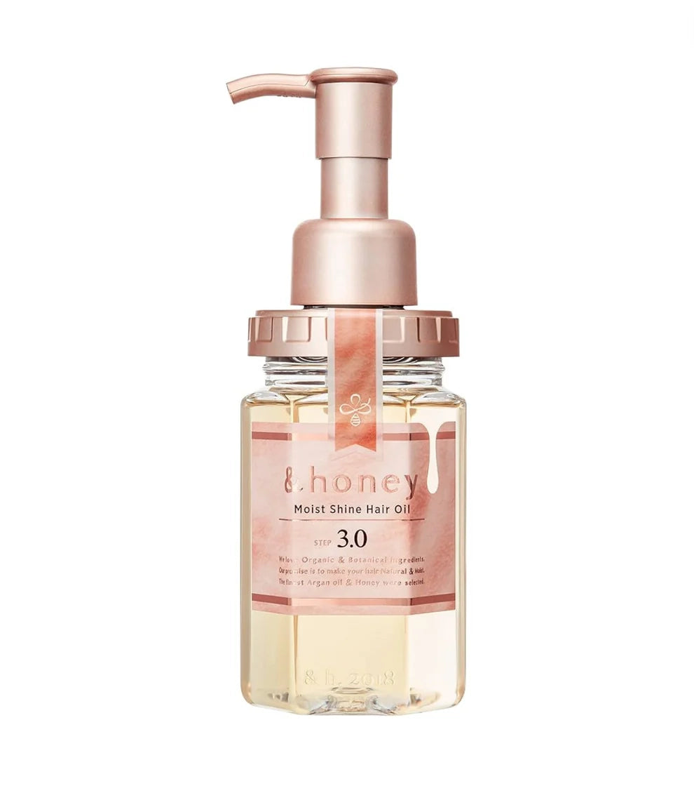 A bottle of &Honey Moist Shine Hair Oil with a pump dispenser, displayed against a white background.