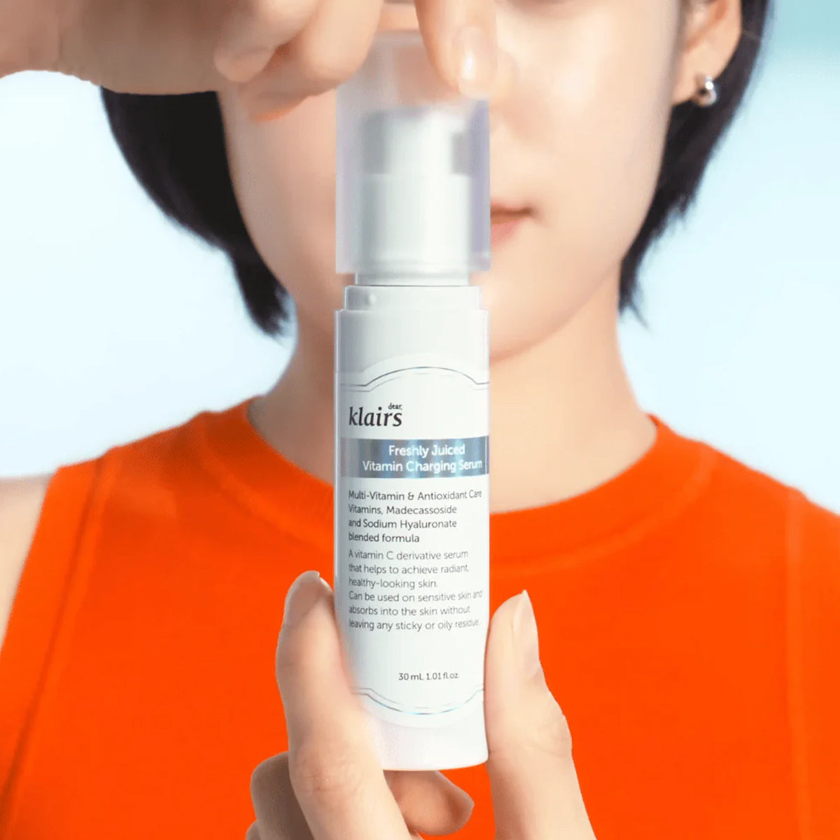dear KLAIRS Freshly Juiced Vitamin Charging Serum | Korean vitamin C serum for brightening and revitalizing dull skin | Shop in Dubai at Mirae Beauty Hub UAE. Person holding