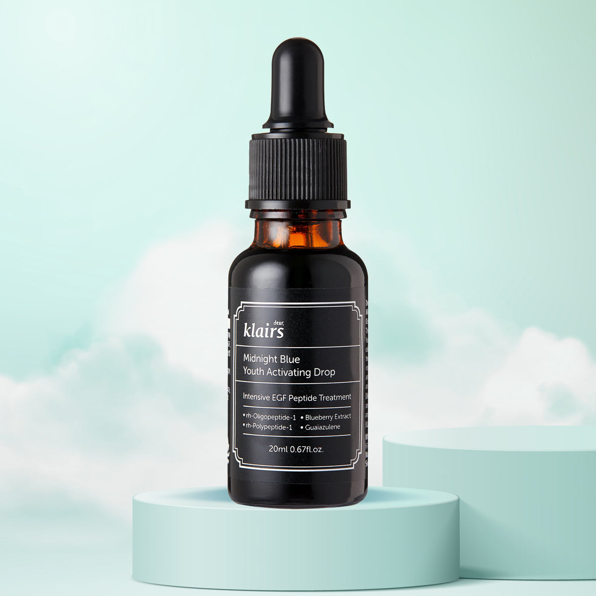 dear Klairs Midnight Blue Youth Activating Drop 20mL | Korean anti-aging serum for sensitive and oily skin in Dubai, UAE. on cloudy background